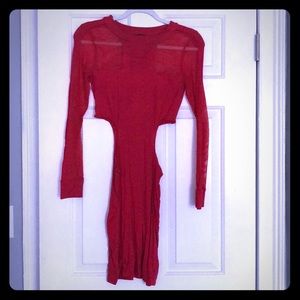 Red long sleeve side cutout dress.